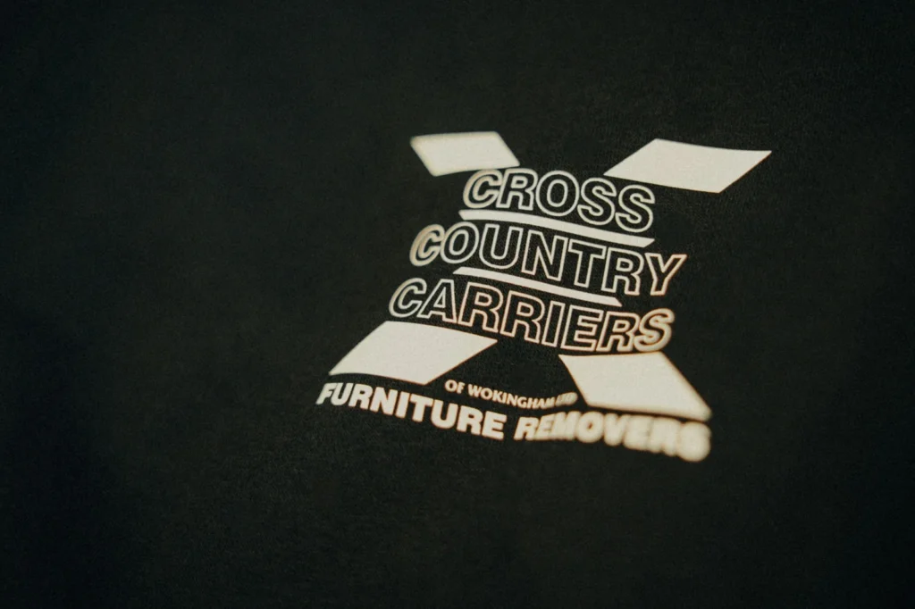Close-up of custom printed dark fabric for Pinewood Gymnastics Club by Jammy Threads.